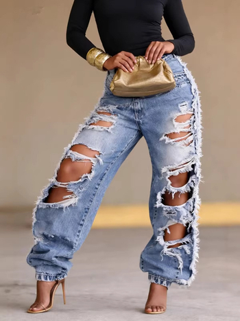 Traperice s visokim strukom i poderotinama, jogger stil, streetwear inspiriran blogerom
