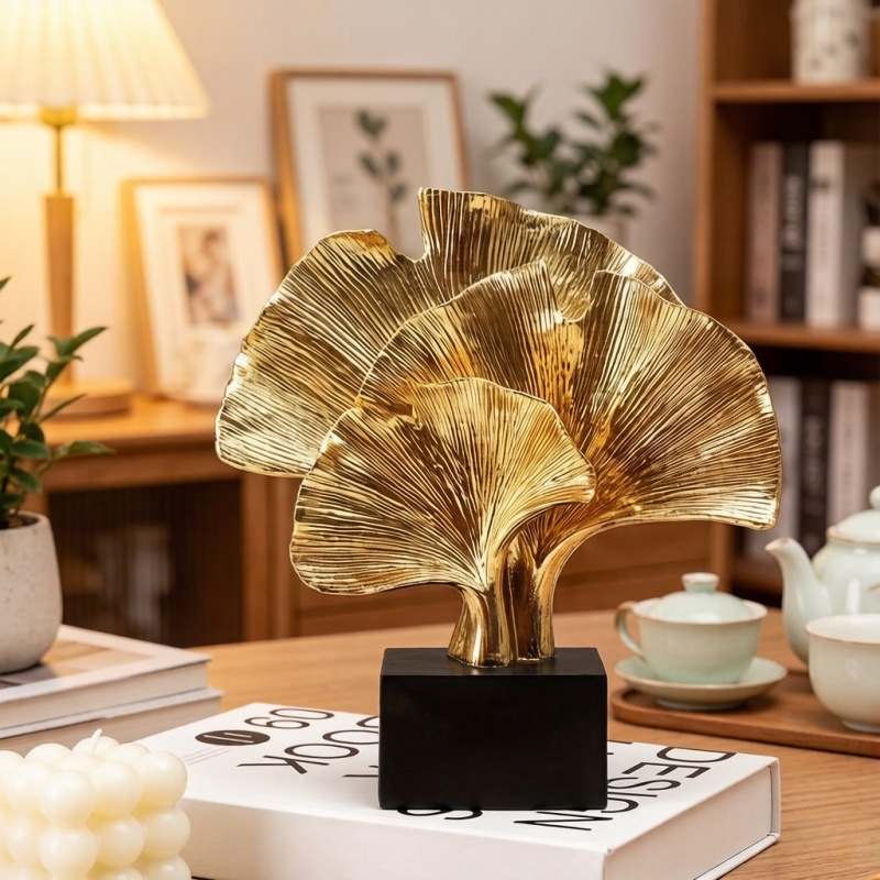 Moderný minimalistický ornament z živice s listom ginkgo pre obývaciu izbu, spálňu, vstupnú halu a študovňu; dekorácia a držiak na knihy.