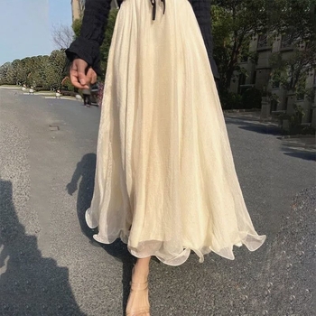 Μακριά φούστα chiffon με oversize γραμμή, κυματοειδή άκρη και λαμπερή όψη