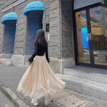 Μακριά φούστα chiffon με oversize γραμμή, κυματοειδή άκρη και λαμπερή όψη