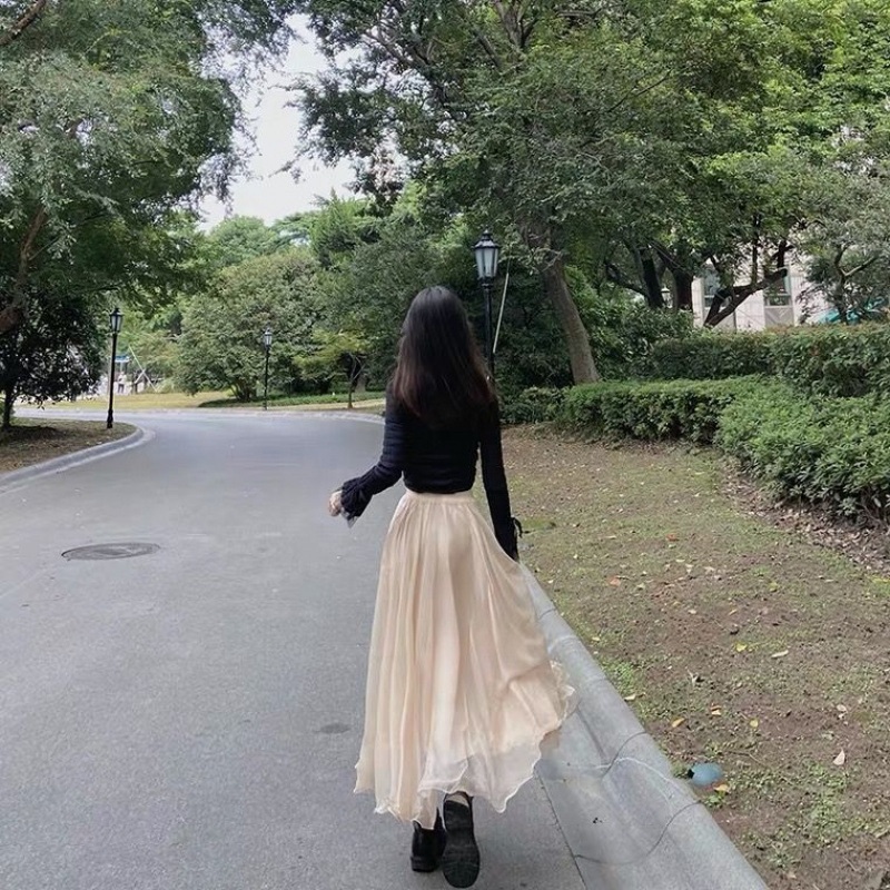 Μακριά φούστα chiffon με oversize γραμμή, κυματοειδή άκρη και λαμπερή όψη