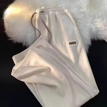 Muške sportske hlače s waflovim uzorkom, slobodnog kroja, ravne, visokog struka, široke nogavice, s etiketom, casual stil.