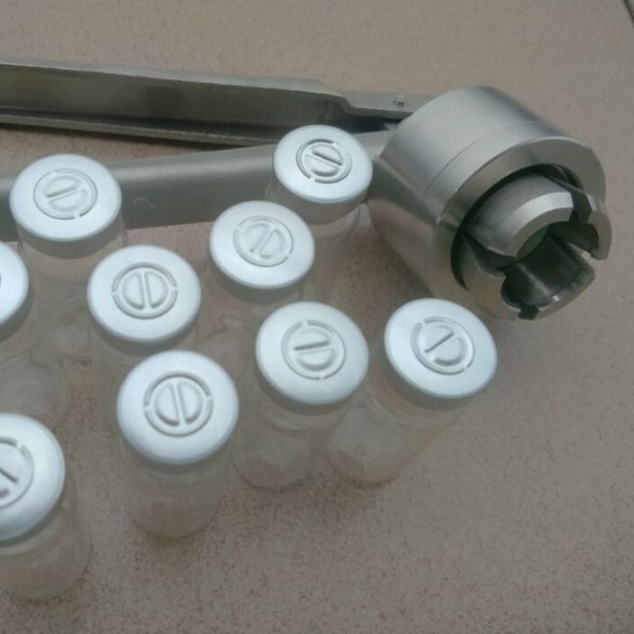 Ručni alat za zatvaranje boca za bočice parfema i tekućine za oralnu upotrebu