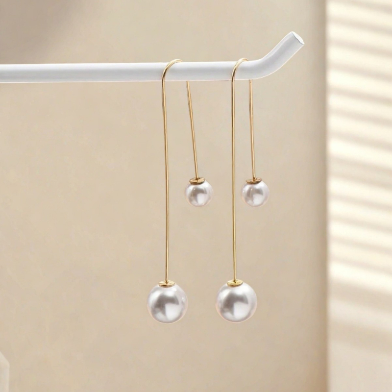 Cercei lungi cu perle artificiale pentru femei – elegante, stil minimalist și versatile