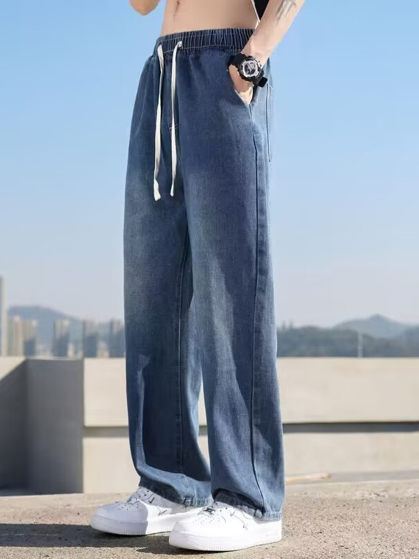 Férfiaknak világoskék farmer laza szabás, mosott denim, egyenes szár, elasztikus derék, mindennapi farmer