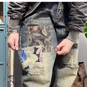 Muške traperice s izrezanim patchworkom i harém stilom, udobne ravne nogavice, denim