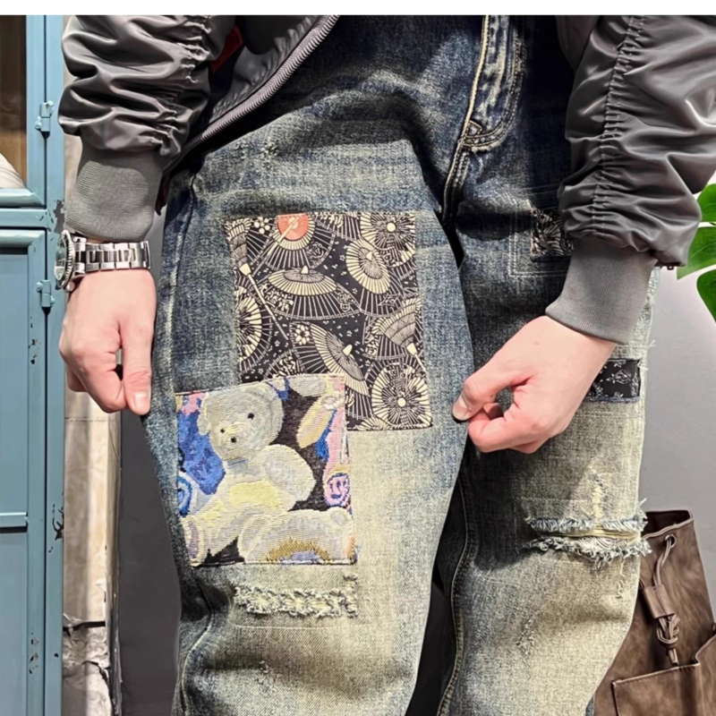 Muške traperice s izrezanim patchworkom i harém stilom, udobne ravne nogavice, denim