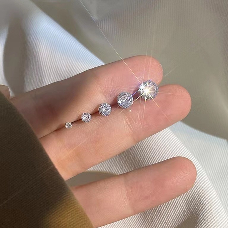 Naušnice od srebra 925, male, s bijelim sjajnim kamenčićima, minimalistički dizajn, unisex, pogodne za nošenje tijekom spavanja