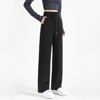 Jesenje ženske hlače s kopčama i džepovima, opušten kroj, ravne do širokih nogavica, casual sportski stil