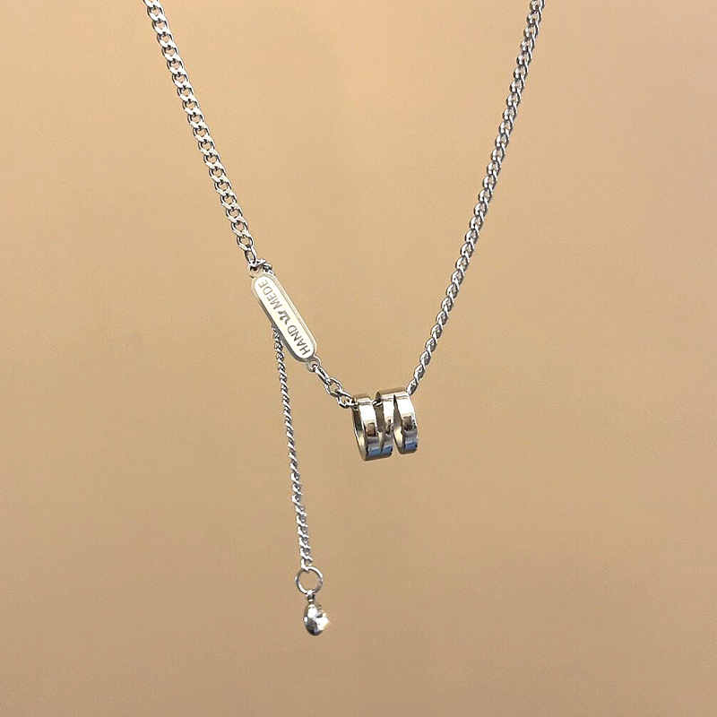 Unisex ogrlica od titan čelika, podesiva duljina 41–50 cm, minimalistički geometrijski dizajn, privjesak od legure