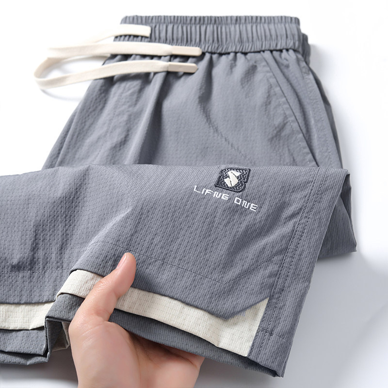 Muške ljetne šorceve 2026 — lagani ice silk materijal, casual sportski kroj, do koljena