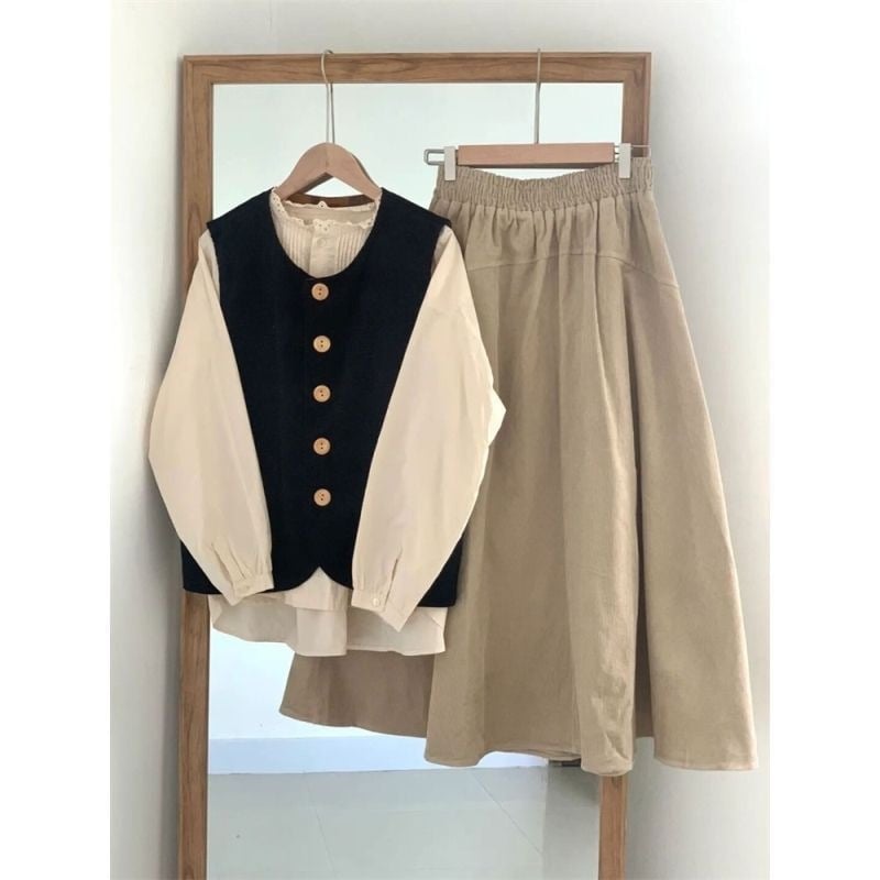Modni ženski jesenski trodijelni set: prsluk, bluza i midi suknja – novi stil 2023