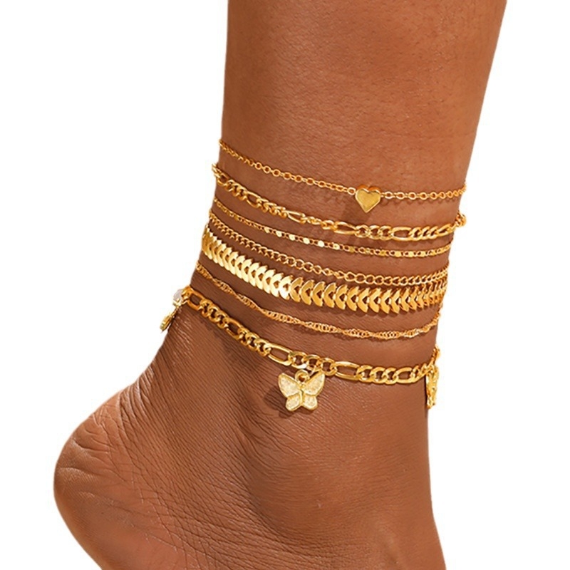 Zlatni ton anklet s privjeskom srca i leptira, višeslojni set od 7 komada