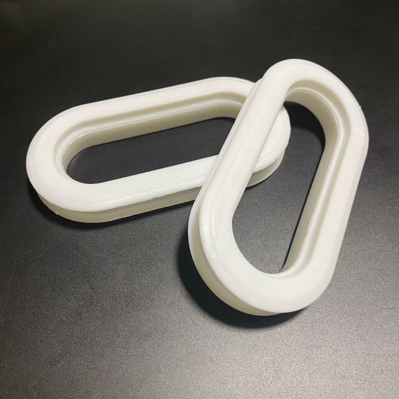 Catarame din plastic pentru mânerul cutiilor din carton ondulat; forme: ovală, hexagonală și pătrată; prindere rezistentă la praf pentru depozitare