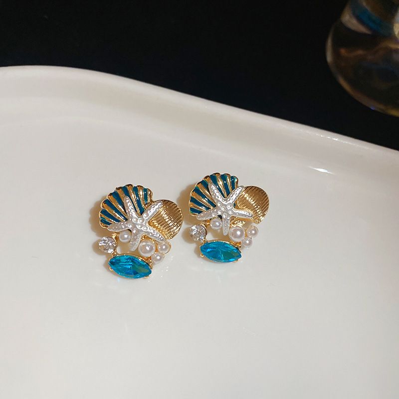 Set naušnica i lančić za ključnu kost; motivi oceanskog života: morska zvijezda, školjka, koral; rhinestones; ručna izrada; luksuzni komadi