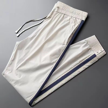 Muške ljetne sportke hlače od ice-silk, uski kroj, tanke, prugaste, brzo se suše