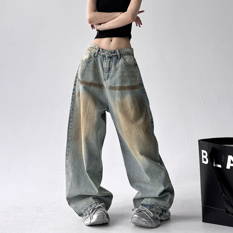 Muške traperice u denimu s pranjem vintage, ravni kroj, opuštene široke nogavice, američki ulični stil