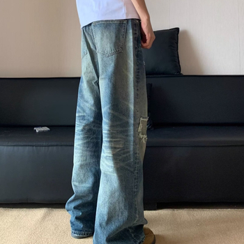 Muške poderane traperice, jesenji opušteni kroj, široke nogavice, dužina do poda, ispran denim