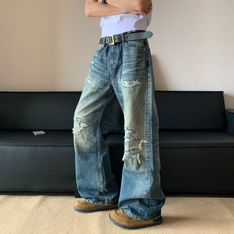Muške poderane traperice, jesenji opušteni kroj, široke nogavice, dužina do poda, ispran denim