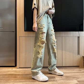 2026 Amerikai stílusú, több zsebes, dekonstruált munkás farmernadrág férfiaknak, őszi trend, laza szabás, mosott denim, széles szár