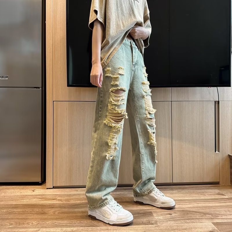 2026 Amerikai stílusú, több zsebes, dekonstruált munkás farmernadrág férfiaknak, őszi trend, laza szabás, mosott denim, széles szár