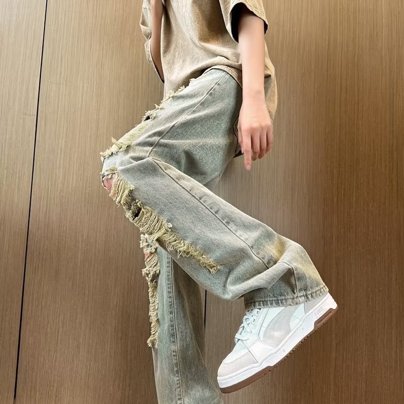 2026 Amerikai stílusú, több zsebes, dekonstruált munkás farmernadrág férfiaknak, őszi trend, laza szabás, mosott denim, széles szár