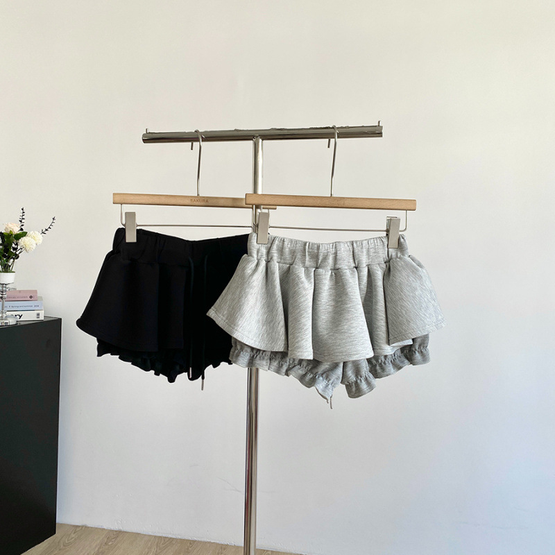 Korejski stil, moda protiv starenja, 2026 crna visoko elastična struk, kopča i veza, A-linija, nafuknute kratke culotte hlače za žene