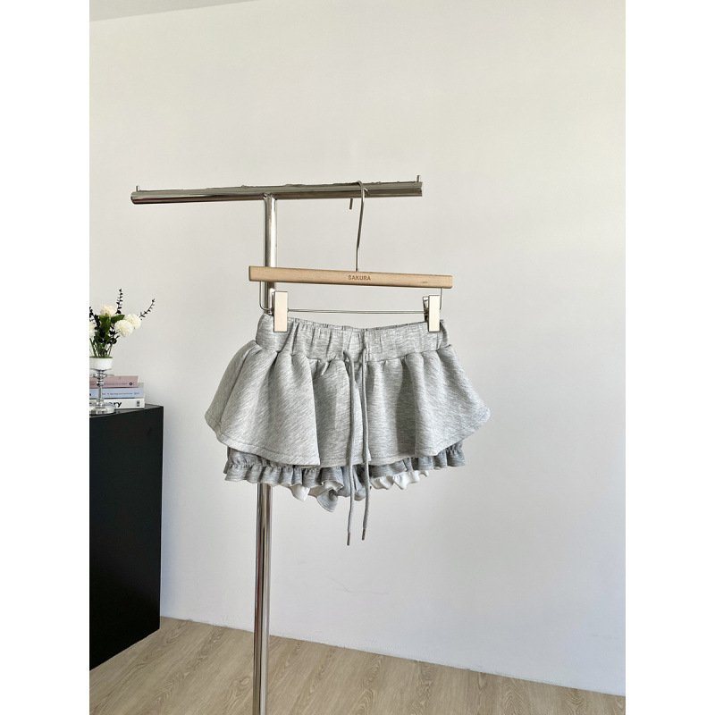 Korejski stil, moda protiv starenja, 2026 crna visoko elastična struk, kopča i veza, A-linija, nafuknute kratke culotte hlače za žene