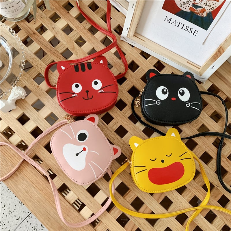 Cicás arckifejezésű PU-bőr gyerekválltáska, kis crossbody gyerekeknek, pénztárca