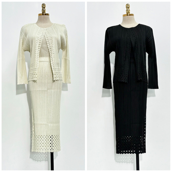 Issey Miyake inspiriran jesenski modni kostim 2025: elegantan trodijelni set s izrezima