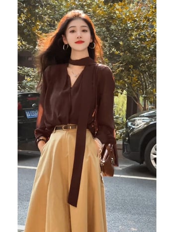Dvodjelni set: opušteni gornji dio s trakom i suknjom, elegantan uredski stil, jesen-zima 2025