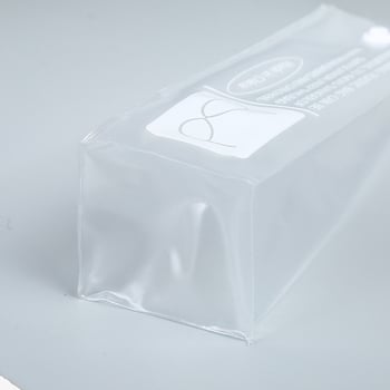 Διαφανές τσαντάκι PVC για καλλυντικά με 3D τριγωνικό κούμπωμα και προσαρμοσμένο λογότυπο