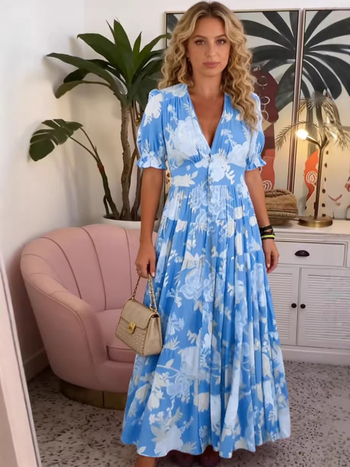 2026 Νέα Plus-Size maxi φόρεμα με V-λαιμό και φλοράλ, για παραθαλάσσιες διακοπές, άνετη γραμμή