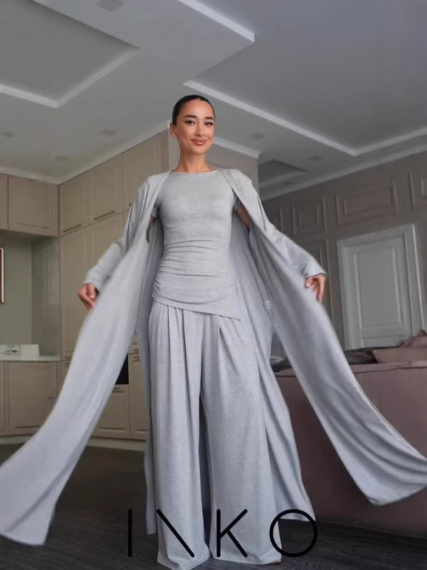 Σετ γυναικείου ρούχου για άνοιξη 2026: μακρύ cardigan, τοπ με μακριά μανίκια, παντελόνια υψηλής μέσης, casual μόδα