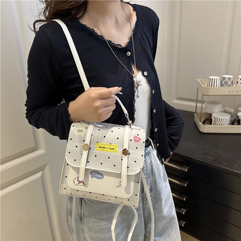 Dievčenský viacúčelový batoh na školu a do mesta – štýlový a ľahký s bodkovaným vzorom, crossbody taška