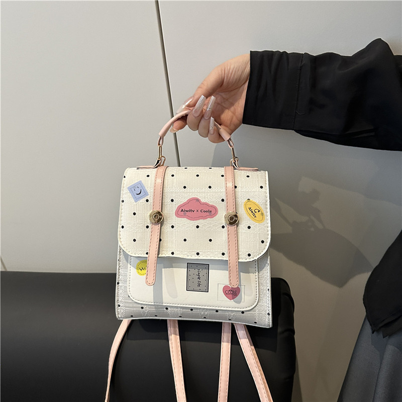 Dievčenský viacúčelový batoh na školu a do mesta – štýlový a ľahký s bodkovaným vzorom, crossbody taška