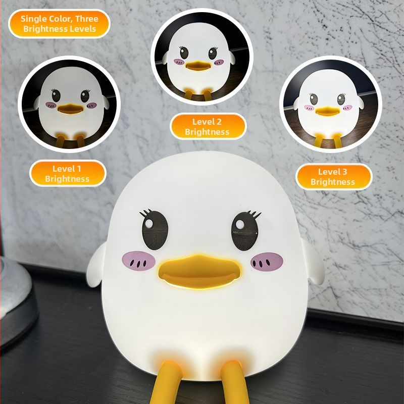 Doudou Duck Tap Lamp — Silikónová nočná lampa so senzorom pohybu, 7 farieb + teplé svetlo, lampa pri posteli pre deti