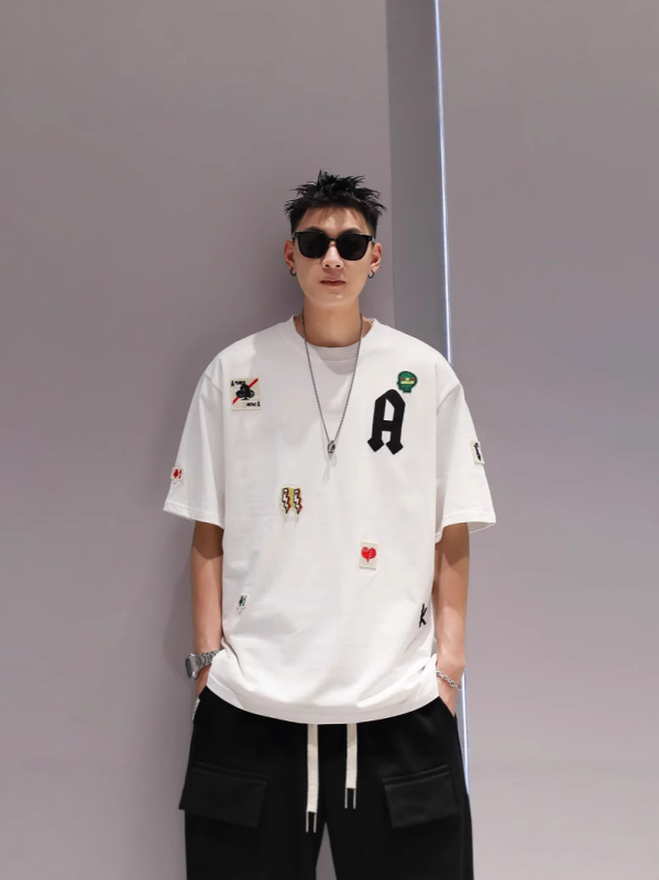 Ανδρική κοντομάνικη T‑shirt σε βαρύ αμερικάνικο στυλ, χαλαρή γραμμή, plus size, στρογγυλή λαιμόκοψη, καλοκαίρι 2025.