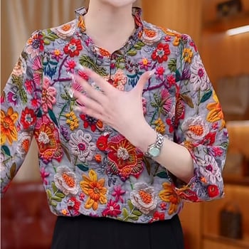 Γυναικεία φλοράλ μπλούζα από chiffon με στάσιμος γιακά και βολάν στην άκρη