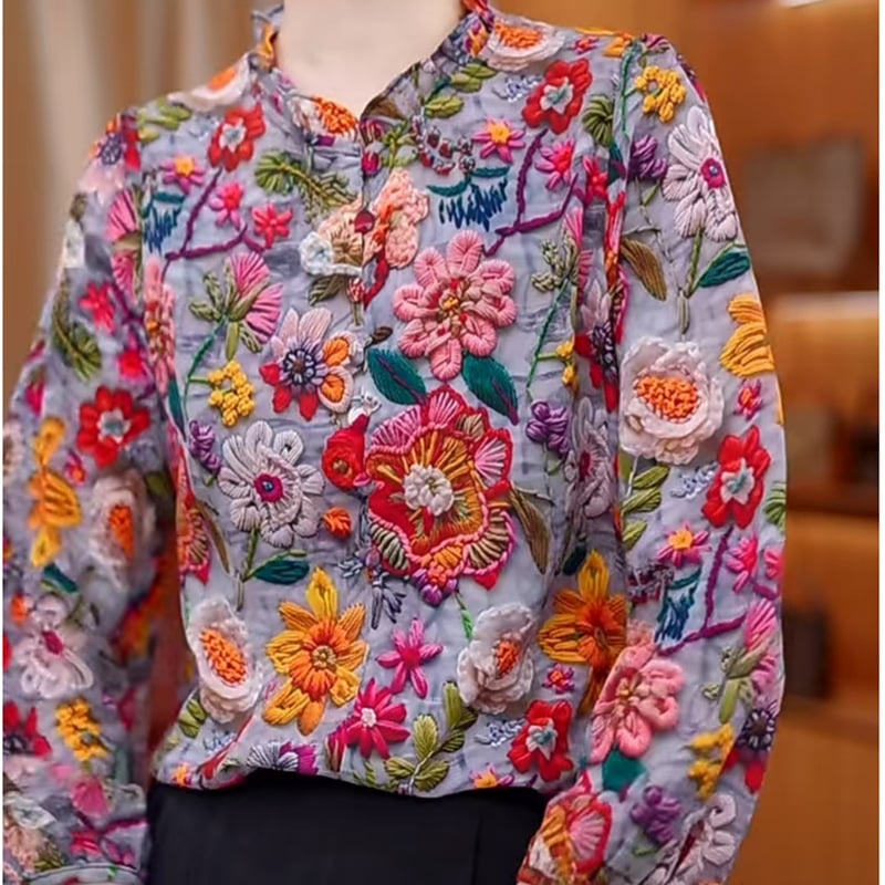 Γυναικεία φλοράλ μπλούζα από chiffon με στάσιμος γιακά και βολάν στην άκρη