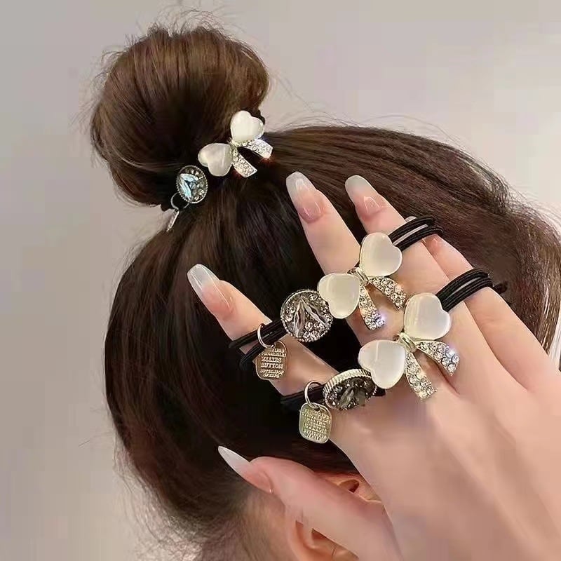 Gumička do vlasov s mačacím očkom a mašličkou, s diamantovým zdobením, elegantný doplnok pre účes