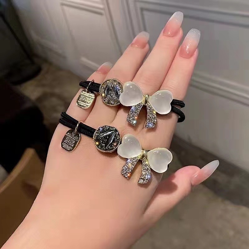 Gumička do vlasov s mačacím očkom a mašličkou, s diamantovým zdobením, elegantný doplnok pre účes