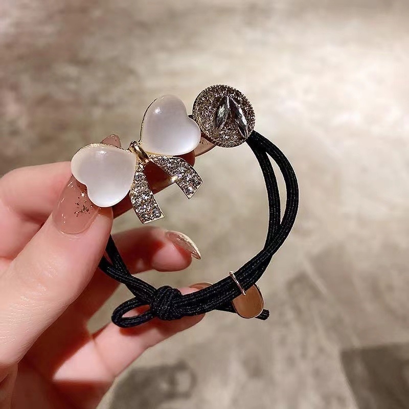 Gumička do vlasov s mačacím očkom a mašličkou, s diamantovým zdobením, elegantný doplnok pre účes