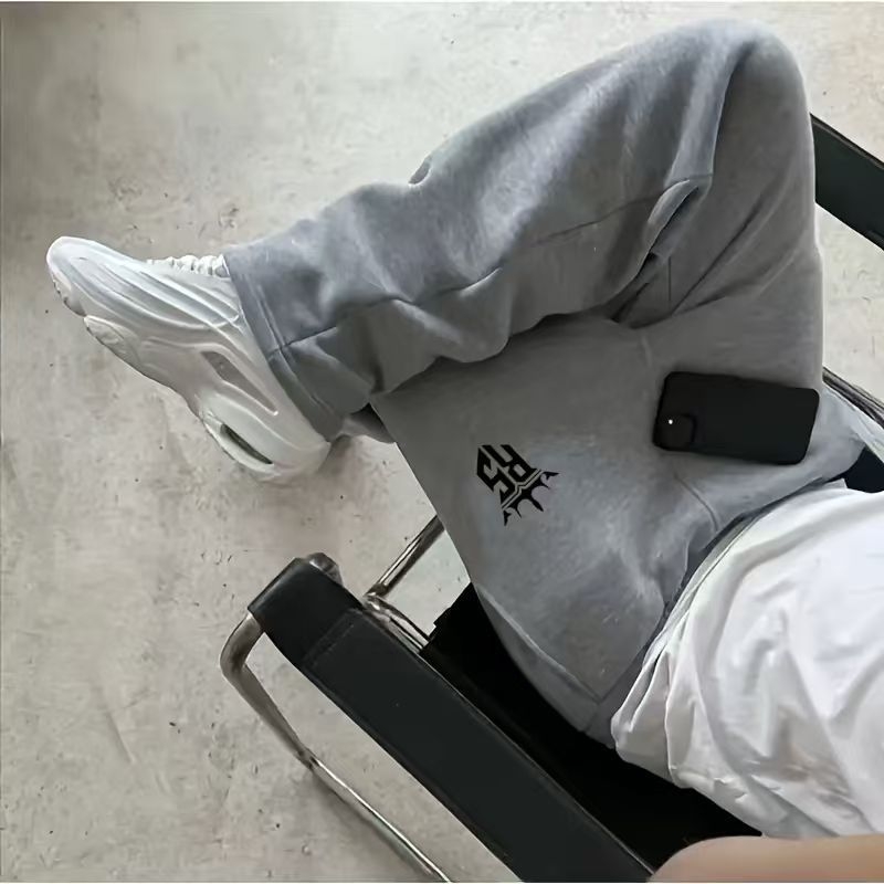 Pantaloni de trening largi pentru bărbați, imprimeu, stil casual, croială lejeră – primăvara 2026