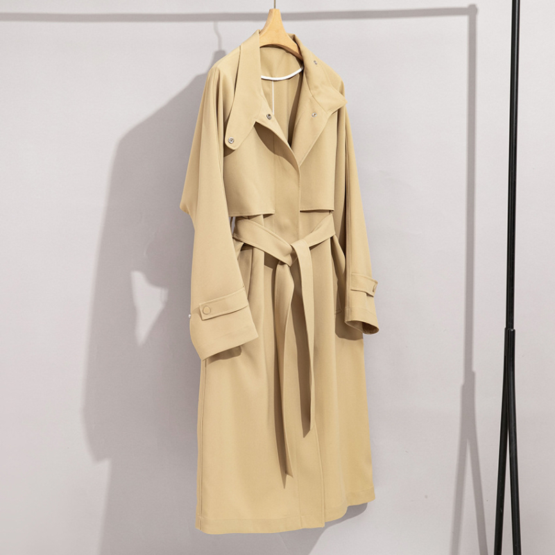 Női trench kabát középhosszú, tavasz–ősz, álló gallér, laza szabás, elegáns mindennapi viselet