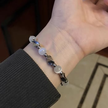 Mobius náramok z titánovej ocele – unisex minimalistický dizajn, geometrický tvar, ľahký luxus