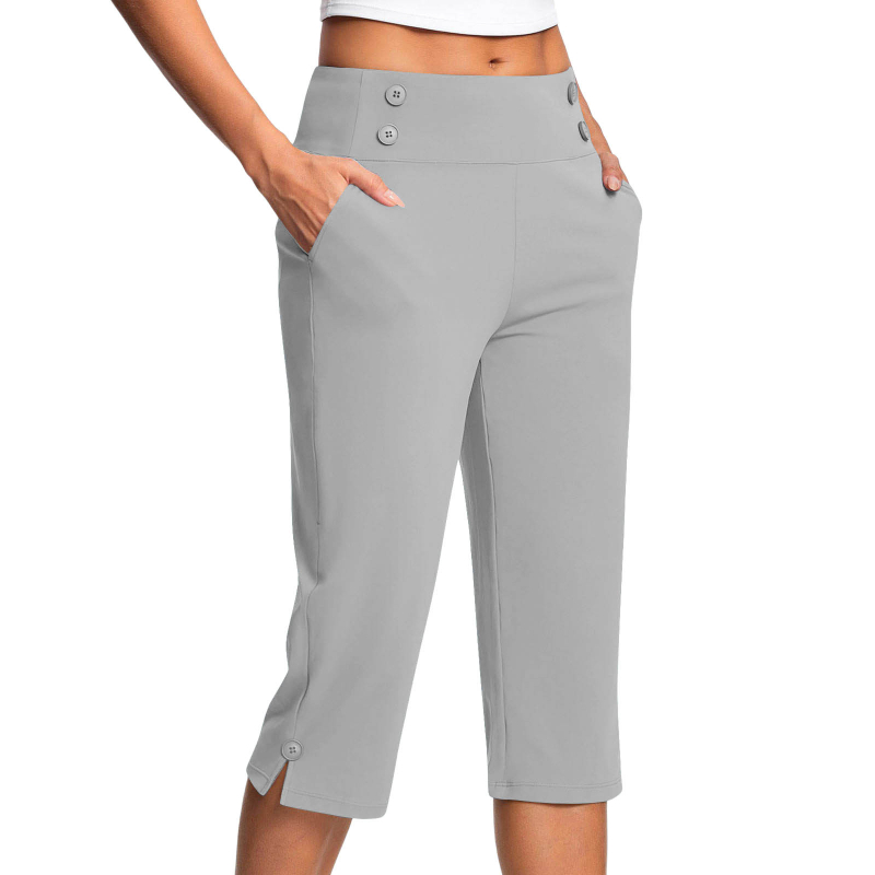 Dámske elastické capri nohavice na jogu a fitness, s vreckami, jednofarebné.