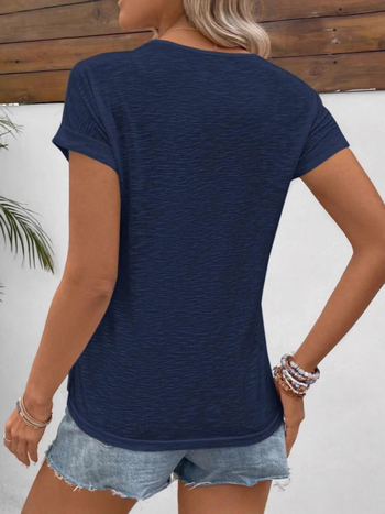 Női egyszínű kerek nyakú T-shirt kivágott panelekkel, 3/4-ös ujjakkal