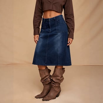 Dámska denimová sukňa strednej dĺžky s vysokým pásom, A-line, vintage praná, s veľkými vreckami, voľný strih.