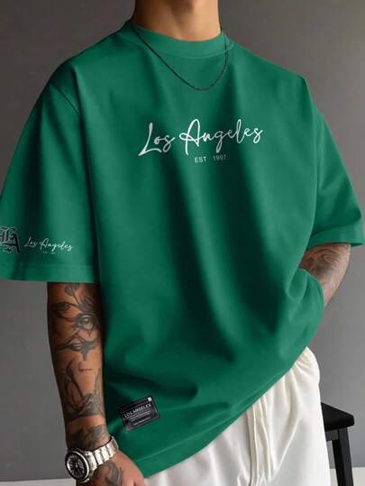 Manfinity LEGND Ανδρικό βαμβακερό T‑shirt με απλό τύπωμα λογότυπου, στρογγυλός λαιμός, κοντά μανίκια